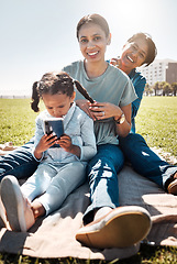 Image showing Family, picnic and park with child, mother and grandma sitting together on grass to relax, bond and smile with three generation girls having fun. Portrait of woman, girl kid and senior lady in nature