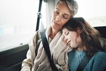 Image showing Woman and girl in car sleeping during road trip, journey or drive for travel, vacation or holiday. Grandmother, child and sleep in van, vehicle or transportation for rest together as family