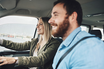 Image showing Couple in car, transport and travel on road trip together, happy on adventure and spending quality time. Young, man and woman drive, love and romance, smile while bonding on the road.
