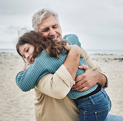 Image showing Happy, grandfather and child hug on beach for love, care and family bonding in the outdoors. Grandpa hugging grandchild embracing relationship in joyful happiness for free time together in nature