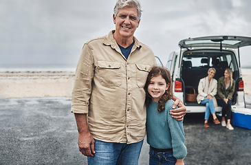 Image showing Car, old man and child on a road trip as a happy family for traveling, adventure and enjoying freedom outdoors. Smile, portrait and senior grandpa with young girl on a winter holiday vacation trip