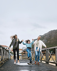 Image showing Happy, travel and family on outdoor walk while on a spring vacation, adventure or journey. Grandmother, mother and girl child walking on bridge together with happiness, fun and bond while on holiday.
