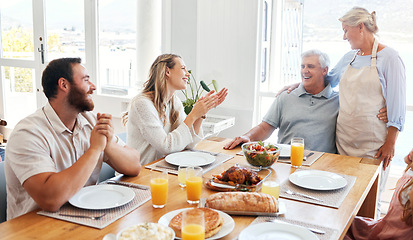 Image showing Food, relax and happy with family at table for lunch, love and smile together in dining room. Eating, holiday and dinner for celebration with couple and parents for retirement, peace and lifestyle