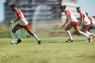 Image showing Soccer, team sports game and teamwork of men busy with football collaboration and workout. Fitness, training and healthy exercise of an healthy athlete ground with fast energy running with a ball