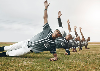 Image showing Fitness, baseball pitch and team stretching before a game or sport training on an outdoor field. Softball, health and men athletes doing a warm up exercise for a match, workout or sports motivation.