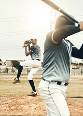 Image showing Baseball player, bat and pitcher on field for sports, fitness and competition in summer sun. Baseball, pitch and game on sand, grass or stadium for sport at baseball game in sunshine for winning