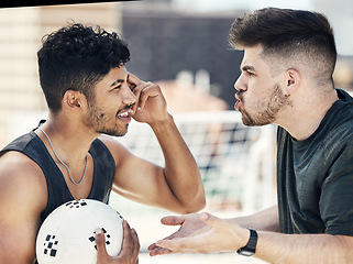 Image showing Angry soccer players fight, problem and argument, conflict and anger in competition sports game. Frustrated, mad and shouting footballer men arguing on pitch about wrong penalty action, fail and rage