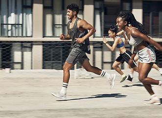 Image showing Exercise, diversity and athlete outdoor running for health, wellness or training together in sportswear. Team, workout and runner doing fitness, for competition or marathon for happy, smile and relax