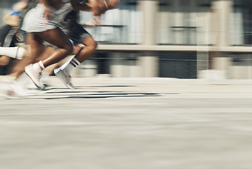 Image showing Sports race, running and sprint competition of fast athlete people or runners on concrete city road for workout, training and fitness. Feet of men and woman outdoor for marathon, speed and energy run