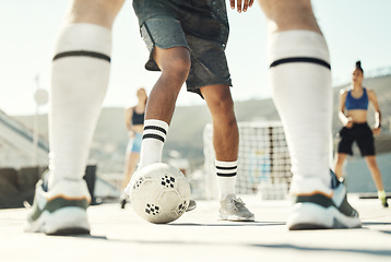 Image showing Football, ball and team of fitness people play a game, training and challenge together in the city. Soccer, workout and sports people play, workout or exercise for health and wellness in urban town