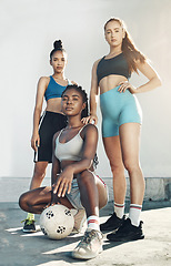 Image showing Team sports, football and portrait of friends standing together with ball on city court outdoors. Woman diversity, sport fitness health and girlfriends empowerment or support before competition match