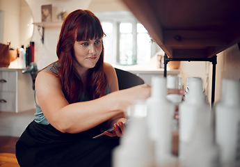 Image showing Woman, hairdresser or tablet for stock check in salon, boutique or hair salon small business. Thinking hair stylist, entrepreneur or worker on technology in hairdressing product management in startup