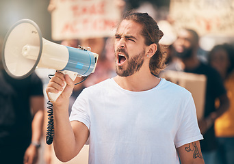 Image showing Megaphone, protest and man leader speaking at rally for politics, equality and human rights. Revolution, outdoor strike and guy shouting with microphone for leadership justice speech in road for riot