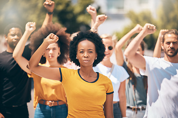 Image showing Protest, group of people with hands in air in street and solidarity for womans rights, human rights and against war. Diversity, men and women in crowd together in support of unity, justice and cause.