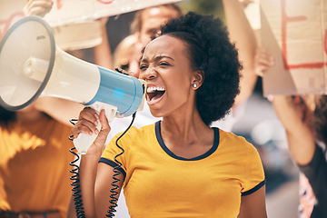 Image showing Protest, megaphone and speech of angry black woman at rally. Loudspeaker, revolution and speaking, screaming or shouting leader on bullhorn protesting for human rights, justice and freedom in city.