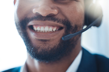 Image showing Black man, call center and phone call, smile with teeth and headphones contact us, communication and customer service and telemarketing closeup. Company, working and help client, sale with customer.