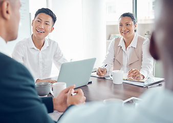 Image showing Business people, collaboration and meeting, business and conference room discussion, diversity workers and technology making notes. Teamwork, working together planning strategy, laptop and notebook.