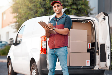 Image showing Delivery, list and courier writing on paper with boxes in a van in a street. Portrait of a young, happy and ecommerce worker working on documents, shipping and service for logistics with a car
