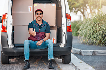 Image showing Delivery, box and man in truck with thumbs up, trust and success in courier service for ecommerce business. Supply chain, cargo and logistics driver with smile in van with retail stock for transport.