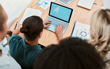 Image showing Teamwork, laptop and green screen top view of business people in office working together. Chroma key, blue screen and documents on table with workers in collaboration planning online project mockup.