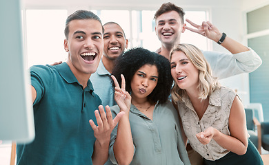 Image showing Happy employees, selfie and team building in office for business people happy, smile and peace sign posing for picture. Diversity, teamwork and collaboration photo with fun men and women work friends