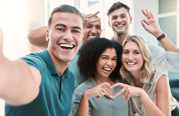 Image showing Happy, selfie and corporate team bonding in office at a meeting or team building together. Diversity, teamwork and young work friends with smile and happiness take photo for fun in company workplace.