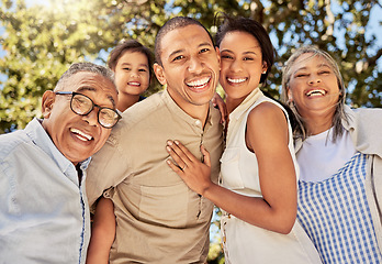 Image showing Big family, portrait smile and hug in nature for quality bonding time for summer vacation in the outdoors. Mother, father and kid with grandparents smiling together in happiness for fun family trip