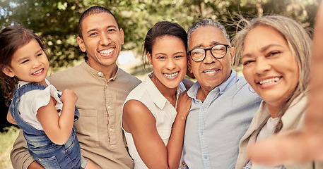 Image showing Selfie, portrait and big family with smile in park for love, care and adventure together during summer in Australia. Happy, child and parents for photo with senior grandparents in a nature garden