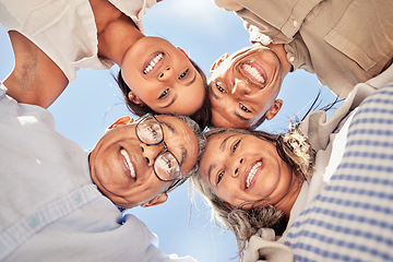 Image showing Portrait, huddle and family with smile for support, love and solidarity from below with blue sky. Face of happy, relax and comic children with senior parents for community and happiness in summer