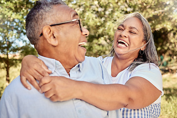 Image showing Happy, love and laugh with a senior couple having fun in a garden or park together during summer. Trees, smile and retirement with an elderly man and woman pensioner bonding while enjoying nature