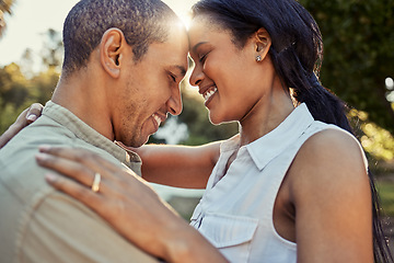 Image showing Hug, love and couple in a park on a holiday in Morocco for marriage, care and freedom together. Happy, young and man and woman with mile for affection, happiness and vacation in nature in summer