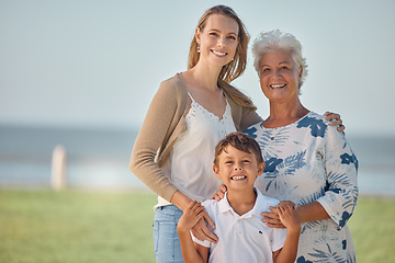 Image showing Mother, grandmother and child happy outdoor together with family love and care in nature. Portrait of a elderly woman, mama and kid smile with a hug by grass and water with happiness smiling