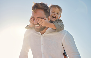 Image showing Happy family, father and child hands covering dads eyes at a beach in summer, playing and having fun with surprise, guess and game. Family, hand and kid closing father eye while walking on vacation