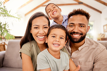 Image showing Black family, kids and sofa for portrait with smile, love and happiness in home, vacation or holiday in summer. Mom, dad and children with happy, face and bonding on couch in house in Los Angeles