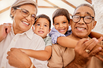 Image showing Grandparents, hug and children together at a house with happiness, family love and child care. Portrait of happy elderly people with kids smiling, bonding and spending quality time at a family home