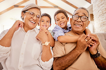 Image showing Grandparents, children and sofa happy in home living room on vacation or holiday together. Kids, grandma and grandpa in retirement smile on couch in lounge with love for family portrait in house