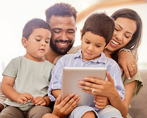 Image showing Family bonding, children and tablet kid game of parents and kids together on a education app. Happy people on digital games, internet and online video watching on a house sofa with technology