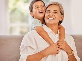 Image showing Grandmother, kid and happy family hug bonding together on a home living room couch. Elderly woman, child and smile of people spending quality time hugging to show love and care on a house sofa