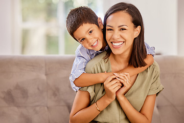 Image showing Boy, mother and sofa show love in home, happy and smile together in living room. Mom, child and couch love with happiness, hug and relax with affection in portrait at family home in Amsterdam