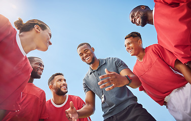 Image showing Soccer, coach and men team in sport, strategy and plan to players before game or match. Coaching, teamwork or support in football group with man talk, communication or conversation with happy smile