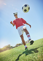Image showing Soccer player, vr and football for kick with man outdoor on field, pitch or park in sunshine. Football play, virtual reality and metaverse for training, exercise or workout in summer with soccer ball