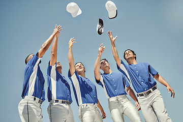 Image showing Baseball, hats and team in celebration at a game, solidarity for sports and support for partnership. Group of athlete friends throwing caps for success, win and to celebrate their teamwork in sport