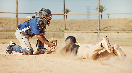 Image showing Baseball, baseball player and diving on home plate sand of field ground sports pitch on athletic sports ball game competition. Softball match, sport training and fitness workout in Dallas Texas dust