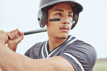 Image showing Baseball player, focus and sports man with bat ready for game competition, exercise workout or practice match. Softball motivation, winner mindset or fitness athlete ready for baseball field training