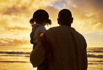 Image showing Father, child and beach silhouette and sunset while on summer vacation, holiday and travel enjoying freedom, view of ocean and golden sky. Man and daughter in brazil for bonding, peace and family