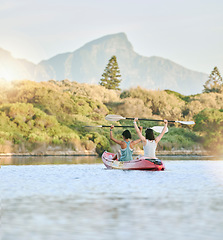 Image showing Woman friends, celebrate in kayak and lake exercise in a canoe together training for summer body fitness. Female rowing, paddle on river and women workout water sport race activity on nature vacation
