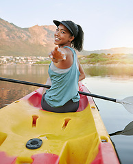 Image showing Kayak, smile and portrait of a happy woman on a lake while on summer adventure, vacation or holiday. Travel, freedom and girl from Mexico on a paddle boat in water for fun fitness exercise in nature.