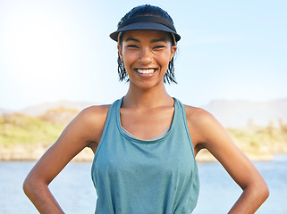 Image showing Lake, sport and fitness portrait of woman ready for outdoor activity in the sunshine with smile. Healthy, wellness and nature girl excited for workout with visor for summer sports in Mexico.