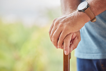 Image showing Disability, senior man and hands on stick for support while walking in a retirement home. Disabled, Handicap and elderly male patient holding a walk aid or cane in a healthcare nursing facility.