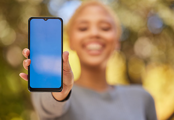 Image showing Green screen phone, mockup and woman blue mobile app for advertising, brand and digital marketing space. Hands, smartphone tech and social media, website network and multimedia web design connection